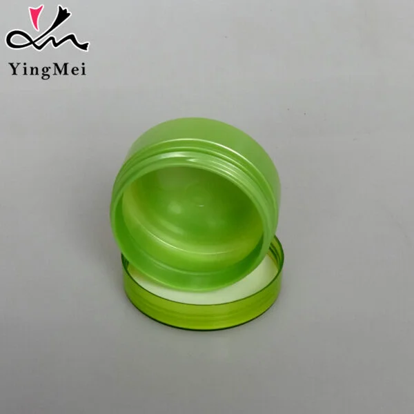 Empty Green Plastic Cosmetic Jar