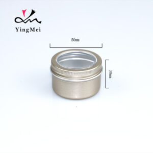gold round aluminum storage jar with transparent lid