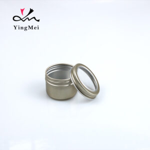 gold round aluminum storage jar with transparent lid