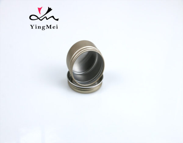 gold round aluminum storage jar with transparent lid